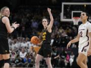 Iowa's Caitlin Clark reacts after being fouled in the final second of the second half of an NCAA Women's Final Four semifinals basketball game against South CarolinaFriday, March 31, 2023, in Dallas.