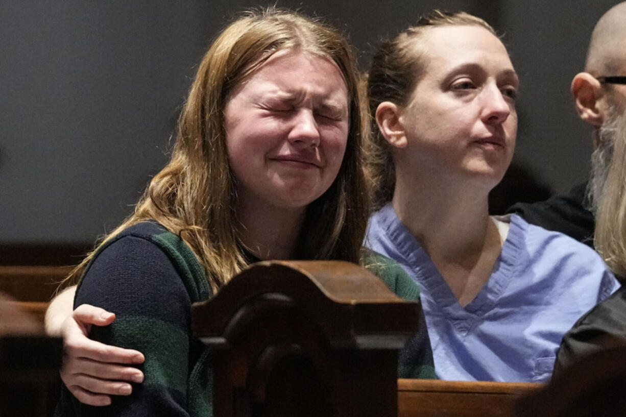 Parishioners participate in a community vigil at Belmont United Methodist Church in the aftermath of school shooting in Nashville, Monday, March 27, 2023, in Nashville, Tenn. Nashville police identified the victims in the private Christian school shooting Monday as three 9-year-old students and three adults in their 60s, including the head of the school.