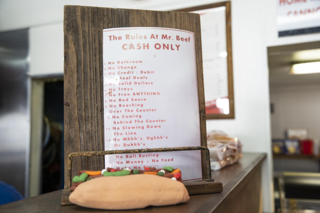 The rules of Mr. Beef are displayed in the shop, Monday, March 6, 2023, in Chicago.  Joseph Zucchero, the founder of the Chicago Italian beef shop that inspired FX's 'The Bear,' died unexpectedly on March 1, 2023, at Rush Medical Center while undergoing treatment for cancer, said his son, Christopher Zucchero, who is a co-owner at the restaurant. He was 69.