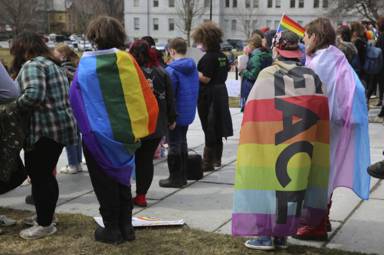 Hundreds of people gather on the lawn of the Vermont Statehouse in Montpelier, on Friday March 31, 2023 in support of transgender rights. The Vermont rally is one of many being held across the country on Friday. The rallies come at a time when Republicans in some state legislatures across the country are considering hundreds of separate bills that would limit transgender rights.