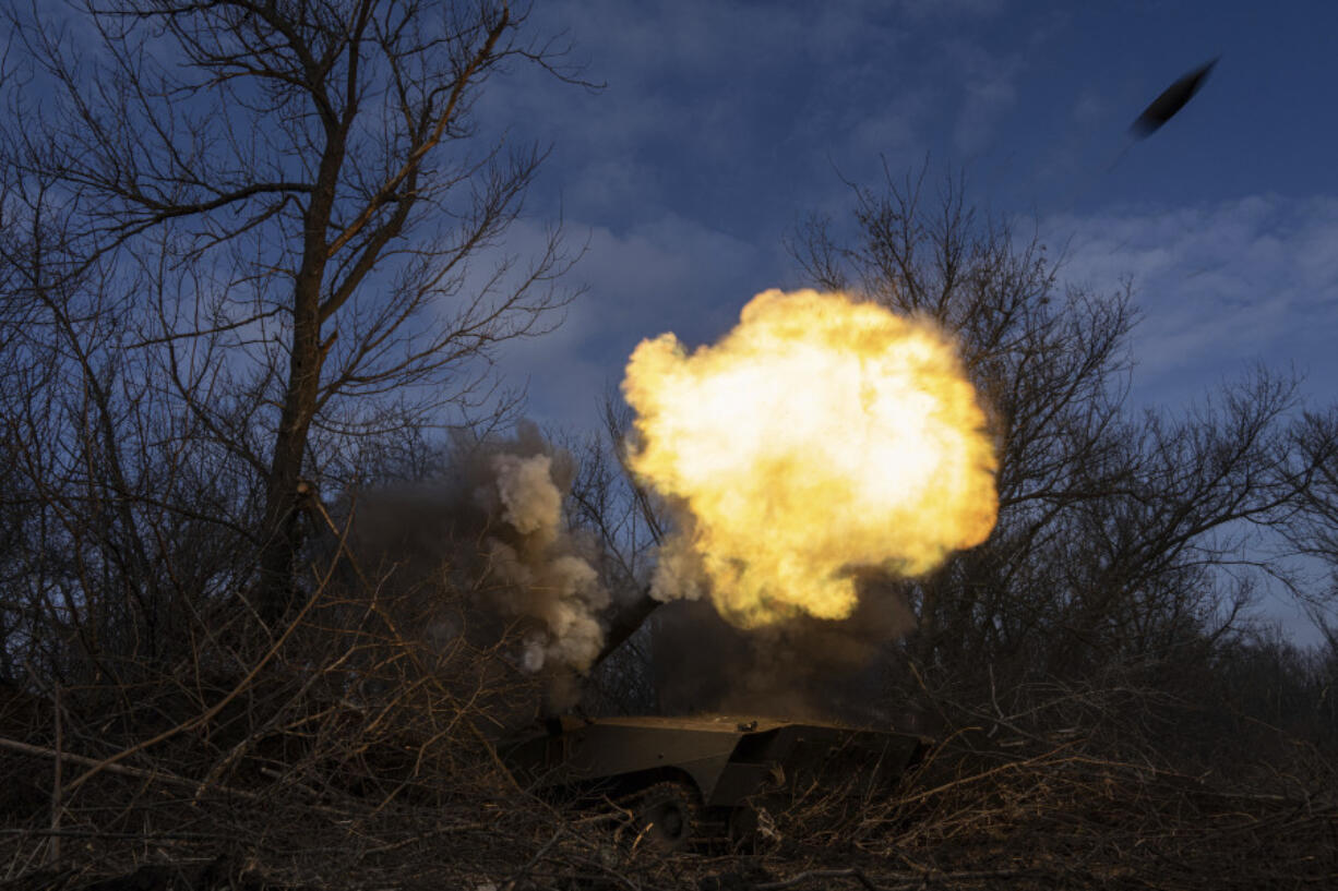 Ukrainian self propelled howitzer 2s1 of 80 Air Assault brigade fires towards Russian forces at the frontline near Bakhmut, Ukraine, Friday, March 10, 2023.