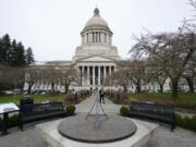 The sun dial stands in front of the Legislative Building at the state Capitol in Olympia in March 2022.