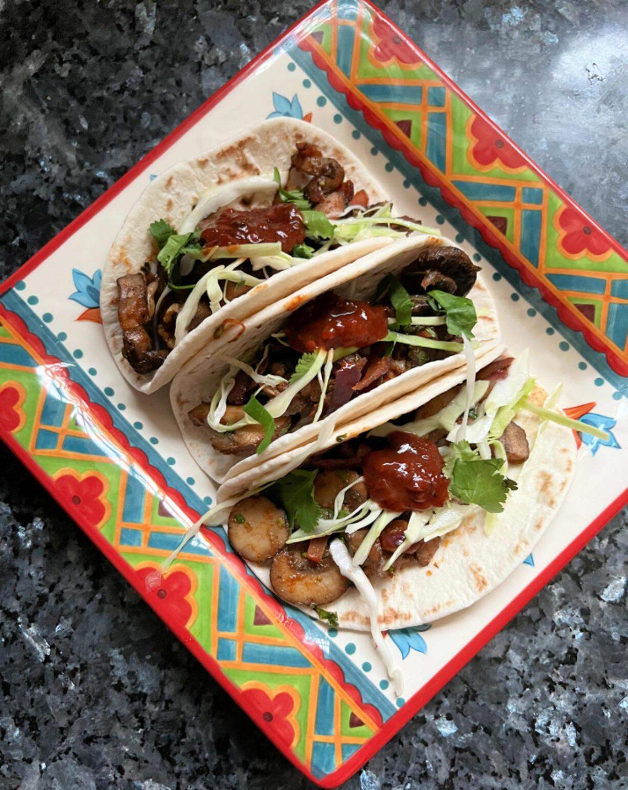 The vegetarian "chorizo" tacos are made with highly seasoned mushrooms.