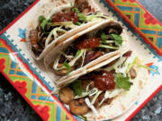 The vegetarian "chorizo" tacos are made with highly seasoned mushrooms.