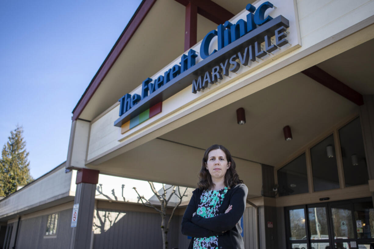 Kate Spencer stands March 21 outside The Everett Clinic in Marysville. Spencer is a deaf patient who has struggled with access challenges at The Everett Clinic.