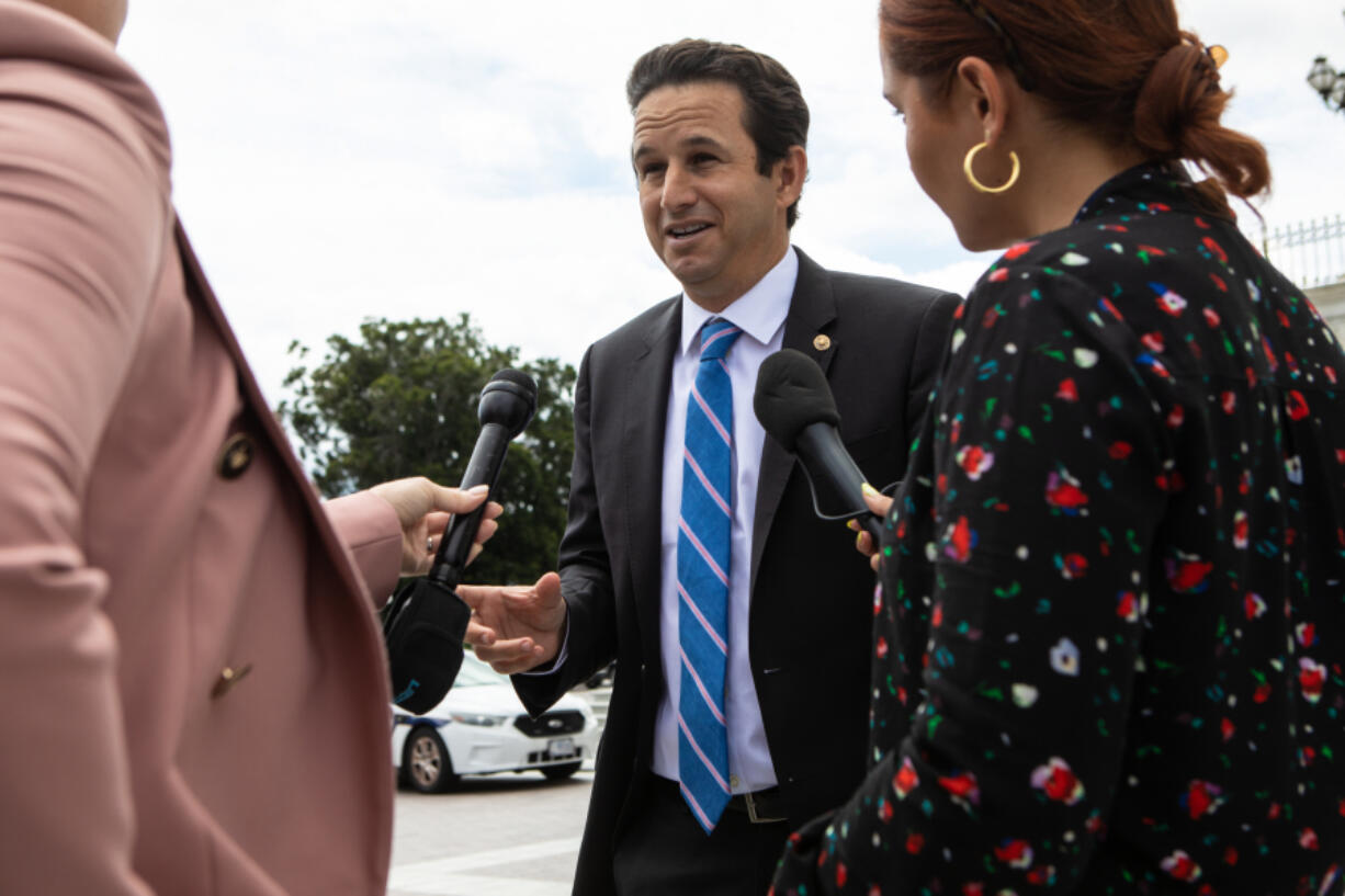 In this photo from Aug. 6, 2022, Sen. Brian Schatz (D-Hawaii) speaks to reporters outside of the U.S. Capitol on Capitol Hill in Washington, DC.