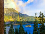 The sun rises over Lake Tahoe's Emerald Bay.