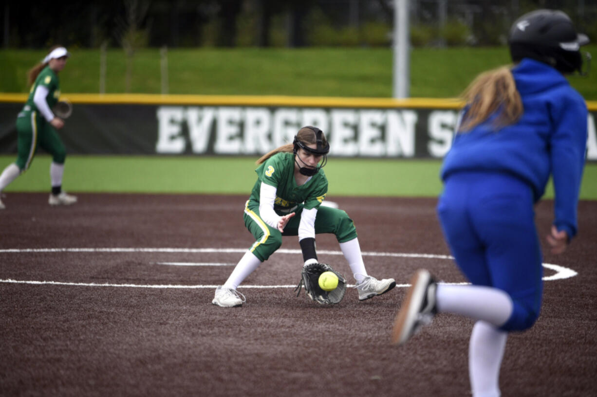 Evergreen pitcher Delaney Bollman fields a ground ball during a 3A Greater St. Helens league softball game against Mountain View on April 21 at Evergreen High.