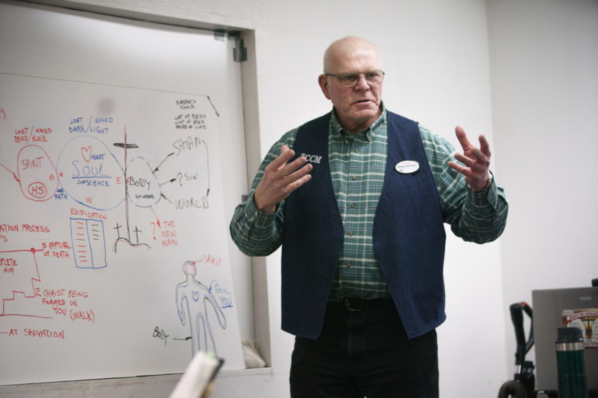 Truck Stop Chaplain Greg Johnson holds a bible meeting with his wife Cyndy at the Trucker’s Christian Chapel at the TA Travel Center in Troutdale, Ore., Sunday, April 23, 2023.