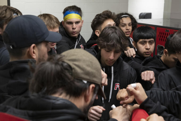 The Fort Vancouver soccer team huddles before its match against Washougal at Fort Vancouver High School on April 13, 2023.