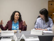 3rd Congressional District Rep. Marie Gluesenkamp Perez, D-Skamania, right, listens to  U.S. Department of Agriculture undersecretary Xochitl Torres Small answer a question Tuesday during a roundtable at Our American Roots farm in Woodland.