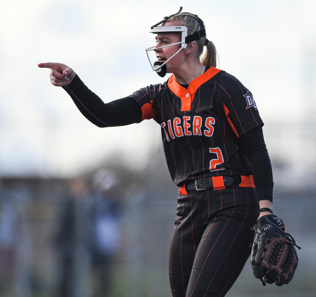 Battle Ground senior Rylee Rehbein points to her catcher after recording a strikeout Wednesday, April 12, 2023, during the Tigers’ 4-0 loss to Skyview at Fort Vancouver High School.