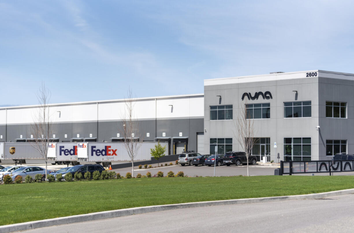 FedEx and UPS trucks sit at loading bays at an Aurora Logistics warehouse in Vancouver. The city enacted a moratorium on large new warehouses at the end of last year.