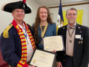 Elizabeth Swift is congratulated for her winning essay and oration by Washington SAR Society President Dr.