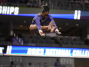 UCLA's Jordan Chiles competes on the uneven parallel bars during the semifinals of the NCAA women's gymnastics championships, Thursday, April 13, 2023, in Fort Worth, Texas.