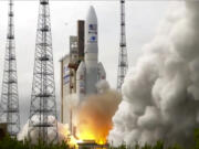 In this image provided by the European Space Agency, an Ariane rocket carrying the robotic explorer Juice takes off from Europe's Spaceport in French Guiana, Friday, April 14, 2023. European spacecraft has blasted off on a quest to explore Jupiter and three of its ice-encrusted moons. Dubbed Juice, the robotic explorer set off on an eight-year journey Friday from French Guiana in South America, launching atop an Ariane rocket.