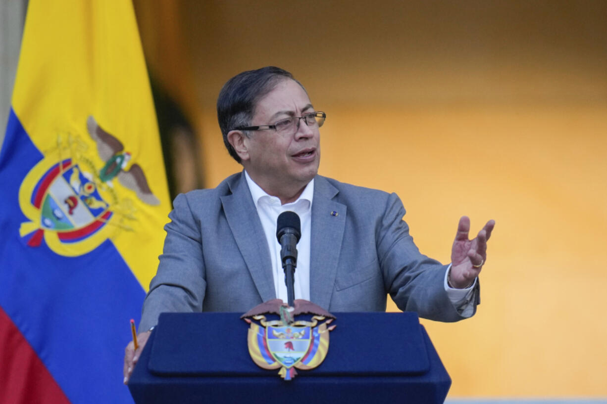 FILE - Colombian President Gustavo Petro speaks to supporters before presenting to Congress a proposed bill to reform the healthcare system, outside the Nari?o presidential palace in Bogota, Colombia, Monday, Feb. 13, 2023. President Joe Biden is hosting Colombian President Gustavo Petro at the White House for talks next week.