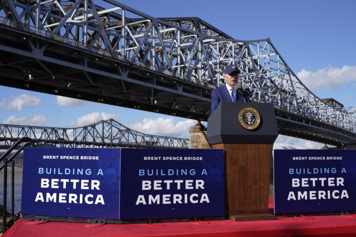 FILE - President Joe Biden speaks about his infrastructure agenda under the Clay Wade Bailey Bridge, Wednesday, Jan. 4, 2023, in Covington, Ky. The Biden administration is closing out a three-week push to highlight the benefits of infrastructure investments in local communities by awarding nearly $300 million to help repair or replace more than a dozen bridges across the country. Events in four states on Thursday, April 13, will mark the end of the beginning of a more expansive White House push heading into Biden's expected 2024 reelection race to remind voters of his accomplishments.