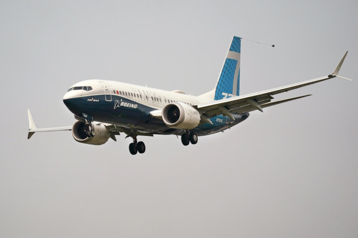 FILE - In this Wednesday, Sept. 30, 2020, file photo, a Boeing 737 Max jet, piloted by Federal Aviation Administration Chief Steve Dickson, prepares to land at Boeing Field following a test flight in Seattle. Boeing said Thursday, April 13, 2023 that production and delivery of a "significant number" of its 737 Max planes could be delayed because of questions about a supplier's work on the fuselages.