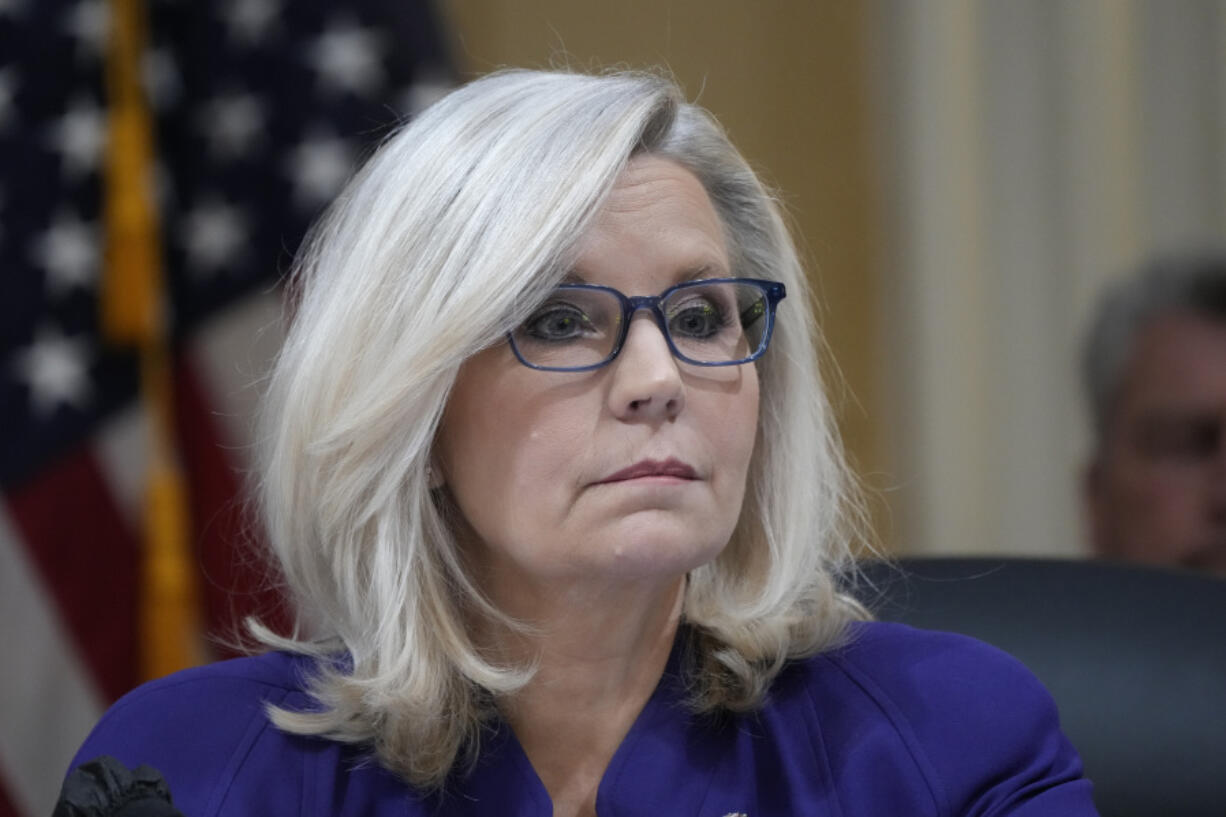 FILE - Vice Chair Rep. Liz Cheney, R-Wyo., listens as the House select committee investigating the Jan. 6 attack on the U.S. Capitol holds its final meeting on Capitol Hill in Washington on Dec. 19, 2022. Cheney has a memoir and a "warning" coming out this fall. In "Oath and Honor," she will write about her estrangement from former President Donald Trump and the Republican Party in the aftermath of the Jan. 6 siege of the U.S. Capitol.