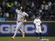 Milwaukee Brewers' Willy Adames gestures as he runs the bases after hitting a solo home run against the Seattle Mariners during the sixth inning of a baseball game Tuesday, April 18, 2023, in Seattle.