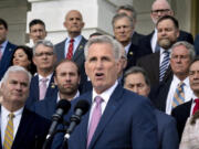 FILE - Speaker of the House Kevin McCarthy, R-Calif., holds an event to mark 100 days of the Republican majority in the House, at the Capitol in Washington, Monday, April 17, 2023. McCarthy is hurtling toward one of the most consequential weeks of the new House Republican majority as he labors to pass a partisan package that would raise the nation's debt limit by $1.5 trillion in exchange for steep cuts that some in his own party oppose. (AP Photo/J.