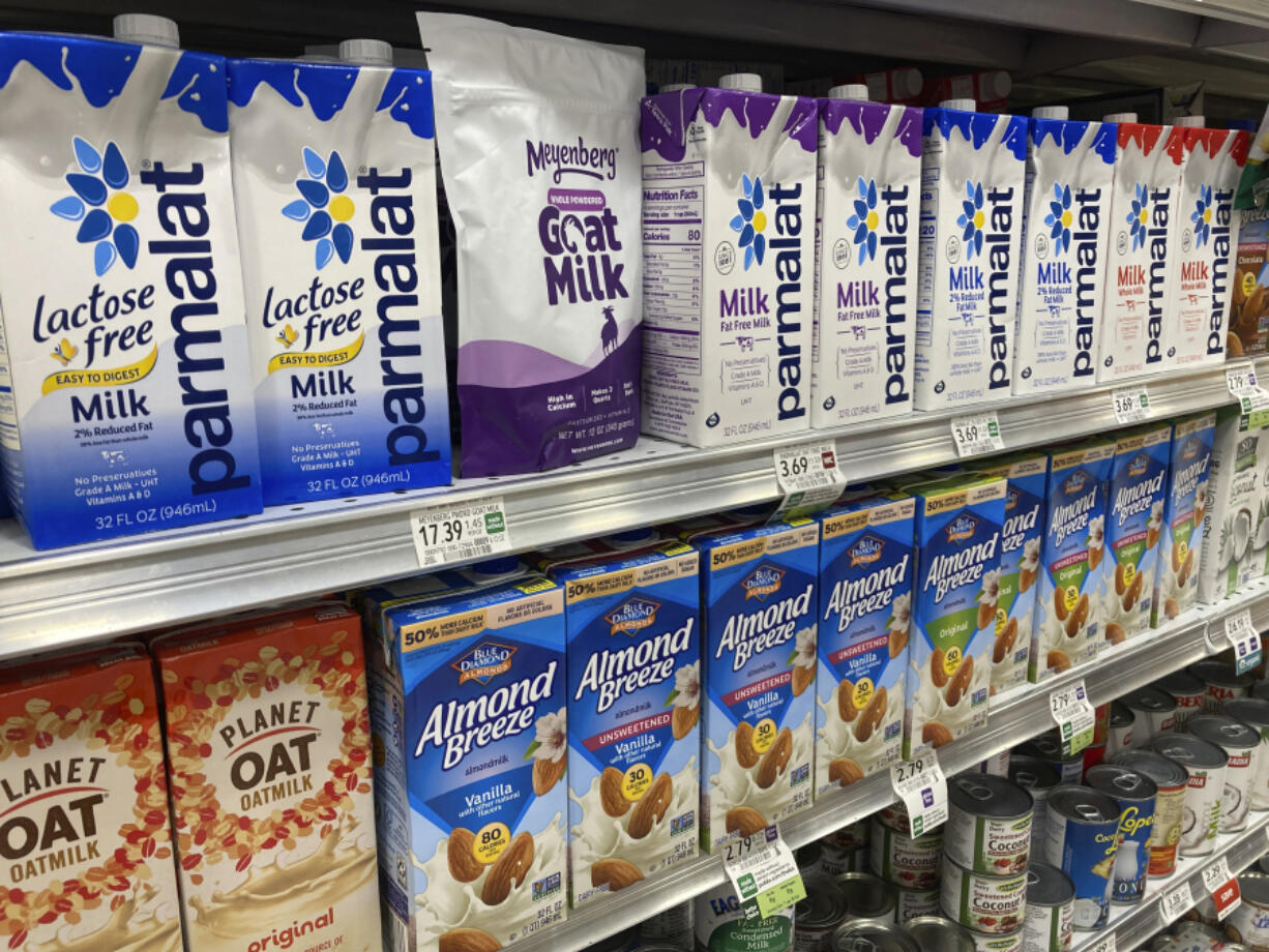 Boxed milk products are shown in a grocery store, Tuesday, April 11, 2023, in Surfside, Fla. On Wednesday, the Labor Department reports on U.S. consumer prices for March.