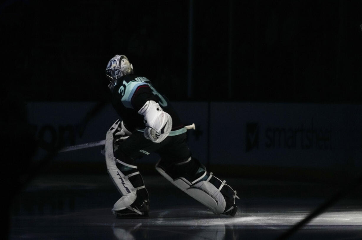 Seattle Kraken goaltender Philipp Grubauer is introduced for the team's NHL hockey game against the Arizona Coyotes, Thursday, April 6, 2023, in Seattle.