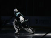 Seattle Kraken goaltender Philipp Grubauer is introduced for the team's NHL hockey game against the Arizona Coyotes, Thursday, April 6, 2023, in Seattle.