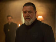 This image released by Sony Pictures shows Russell Crowe as Father Gabriele Amorth in a scene from Screen Gems' "The Pope's Exorcist." (Jonathan Hession/Sony Pictures via AP)