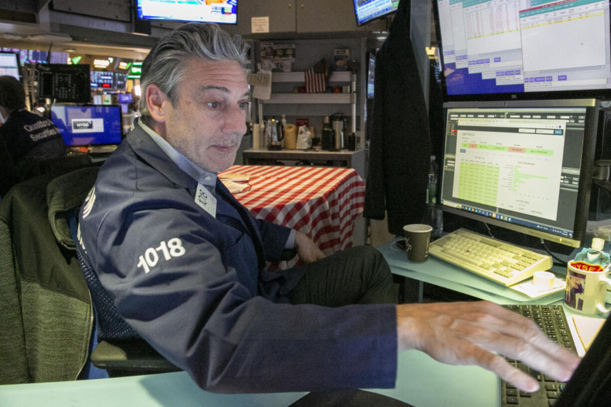 Traders work on the New York Stock Exchange floor in New York City on Tuesday, April 18, 2023.