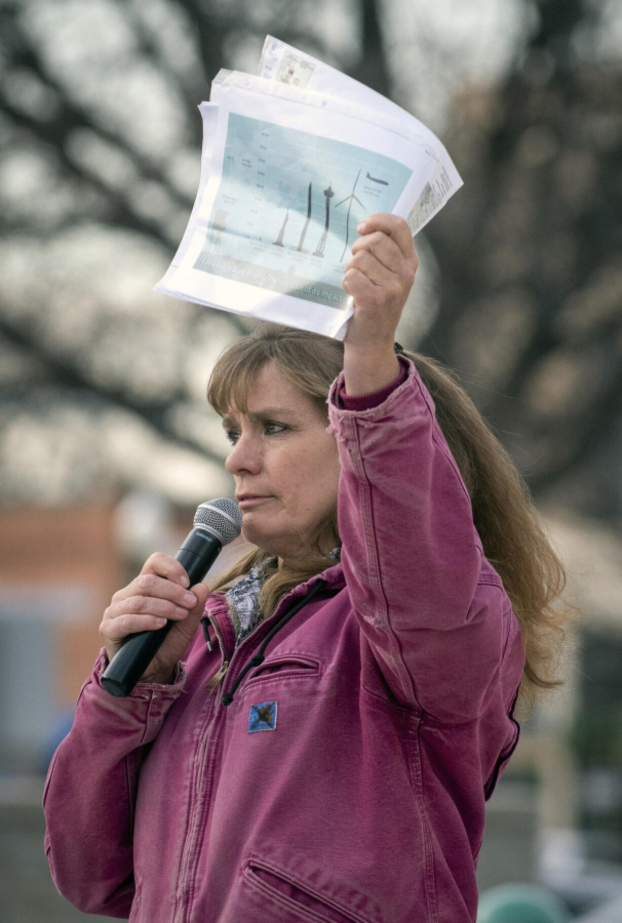 Joan Hurlock talks about concerns associated with the proposed Lava Ridge Wind Project during a rally, Tuesday, April 11, 2023, at the Downtown Commons in Twin Falls, Idaho. At a capacity of 1,000 megavolts, Lava Ridge would be the largest wind energy project on public lands and the second largest facility in the U.S. The project would double the amount of wind energy produced in Idaho, according to the Times-News.