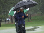 Brooks Koepka elks on the seventh green during the weather delayed third round of the Masters golf tournament at Augusta National Golf Club on Saturday, April 8, 2023, in Augusta, Ga. (AP Photo/David J.