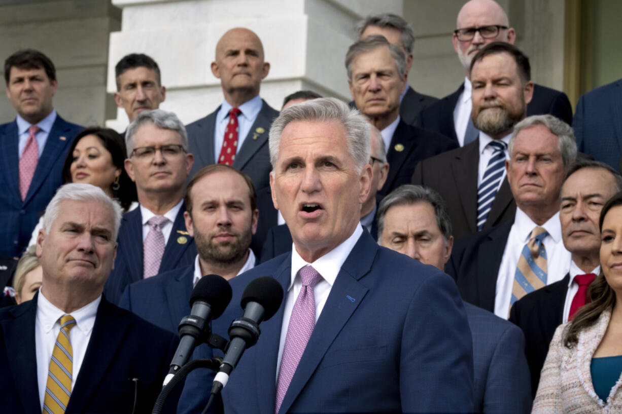 Speaker of the House Kevin McCarthy, R-Calif., holds an event to mark 100 days of the Republican majority in the House, at the Capitol in Washington, Monday, April 17, 2023. In a speech Monday at the New York Stock Exchange, the Republican leader accused President Joe Biden of refusing to engage in budget-cutting negotiations to prevent a debt crisis. (AP Photo/J.