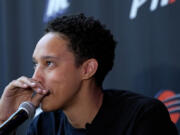 WNBA basketball player Brittney Griner fights back tears at a news conference, Thursday, April 27, 2023, in Phoenix.