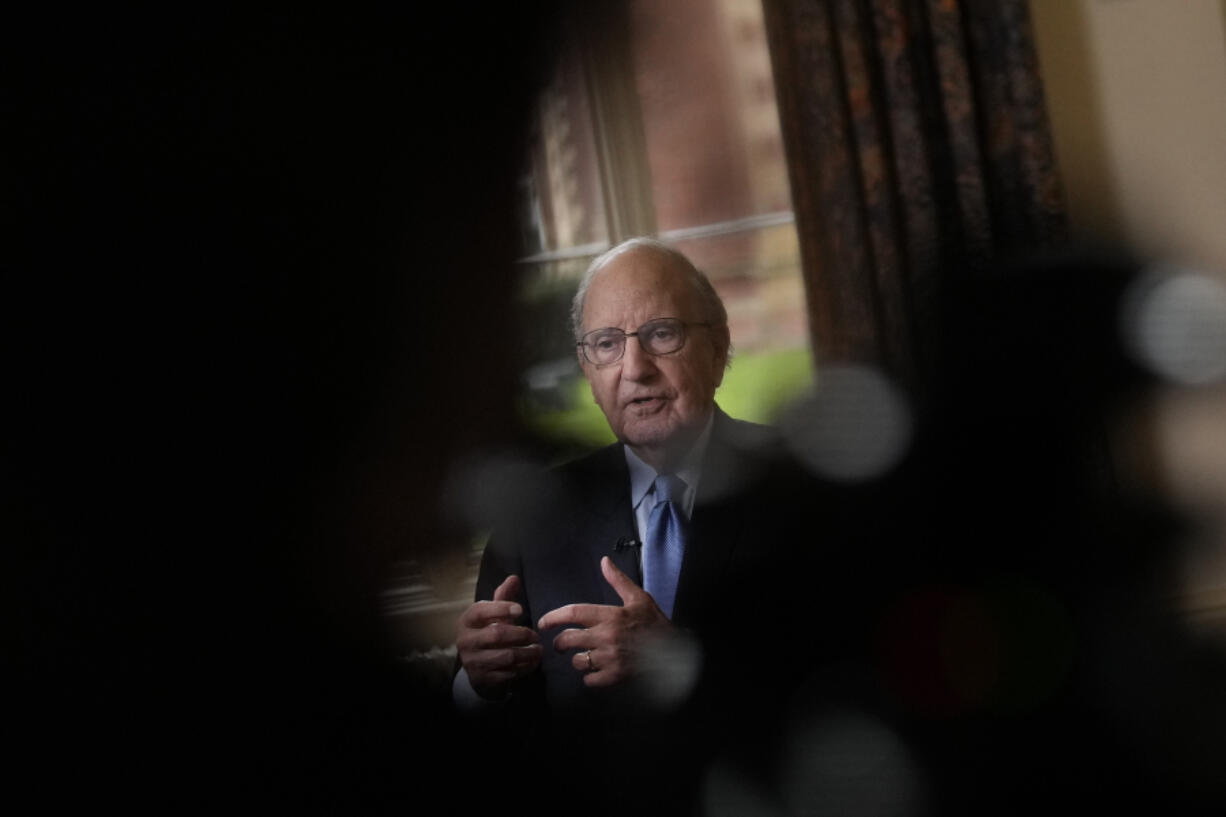 Former U.S. Sen. George Mitchell speaks during an interview at Queen's University in Belfast, Northern Ireland, Tuesday, April 18, 2023. Mitchell told a conference to mark a quarter century since the Good Friday Agreement that Northern Ireland's leaders must "act with courage and vision as their predecessors did 25 years ago," when bitter enemies forged an unlikely peace.