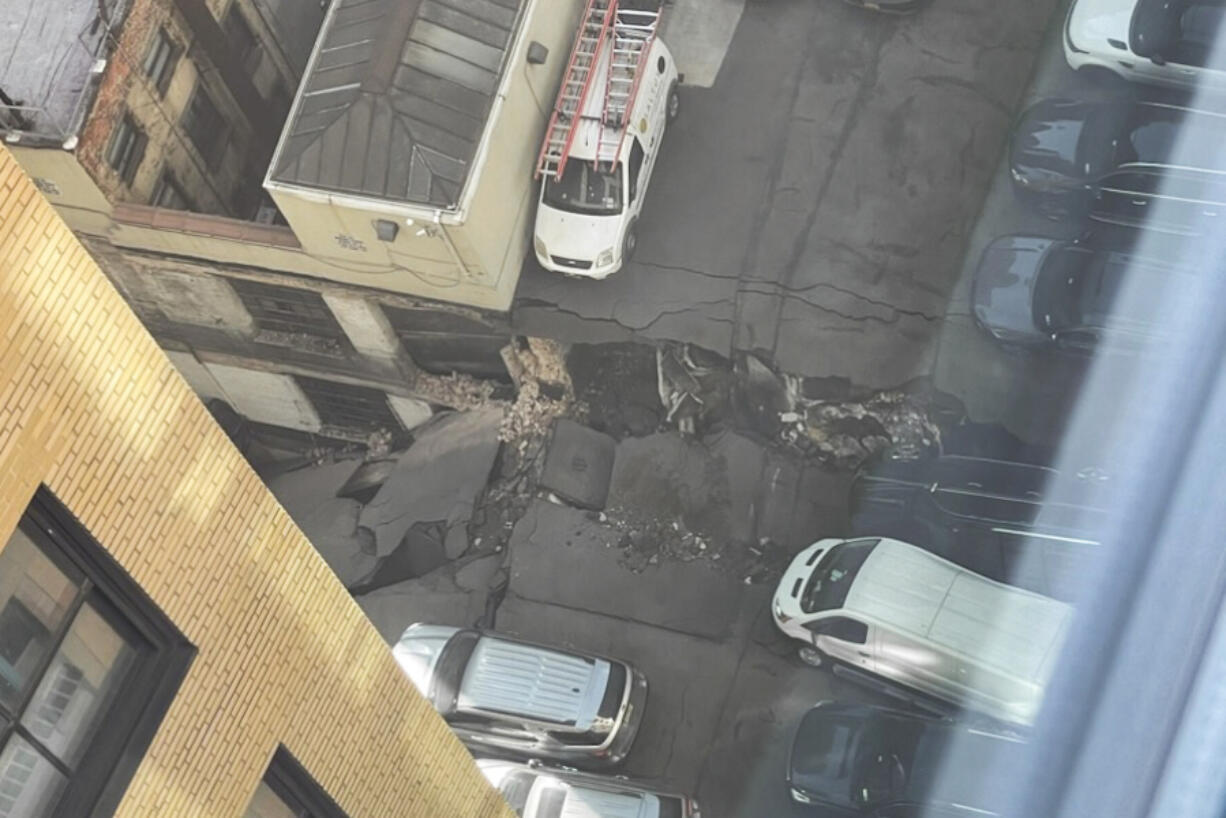 This photo provided by Charlie Franklin shows a partially collapsed parking garage in lower Manhattan's Financial District, Tuesday, April 18, 2023, in New York. Officials didn't immediately release any information on injuries.