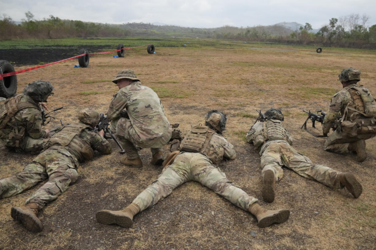 U.S. soldier practice drills during a joint military exercise called "Balikatan," Tagalog for shoulder-to-shoulder at Fort Magsaysay, Nueva Ecija province, northern Philippines, Thursday, April 13, 2023. This year's Balikatan exercises between the treaty allies are the largest since the two sides started joint military combat-readiness exercises in the early 1990s.