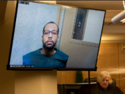 Kirkland C. Warren, 27, of Vancouver makes a first appearance Monday, April 3, 2023, in Clark County Superior Court on suspicion of two counts of first-degree murder in the shooting deaths of Meshay Melendez, 27, and her 7-year-old daughter, Layla Stewart. Prosecutors say they plan to charge Warren with aggravated murder.