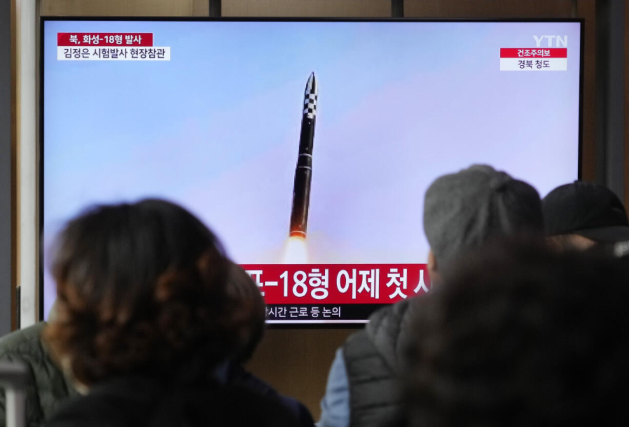 A TV screen shows an image of North Korea's missile launch during a news program at the Seoul Railway Station in Seoul, South Korea, Friday, April 14, 2023. North Korea said Friday it has successfully test-launched a new intercontinental ballistic missile powered by solid propellants, a development that if confirmed could provide the country with a harder-to-detect weapon targeting the continental United States.