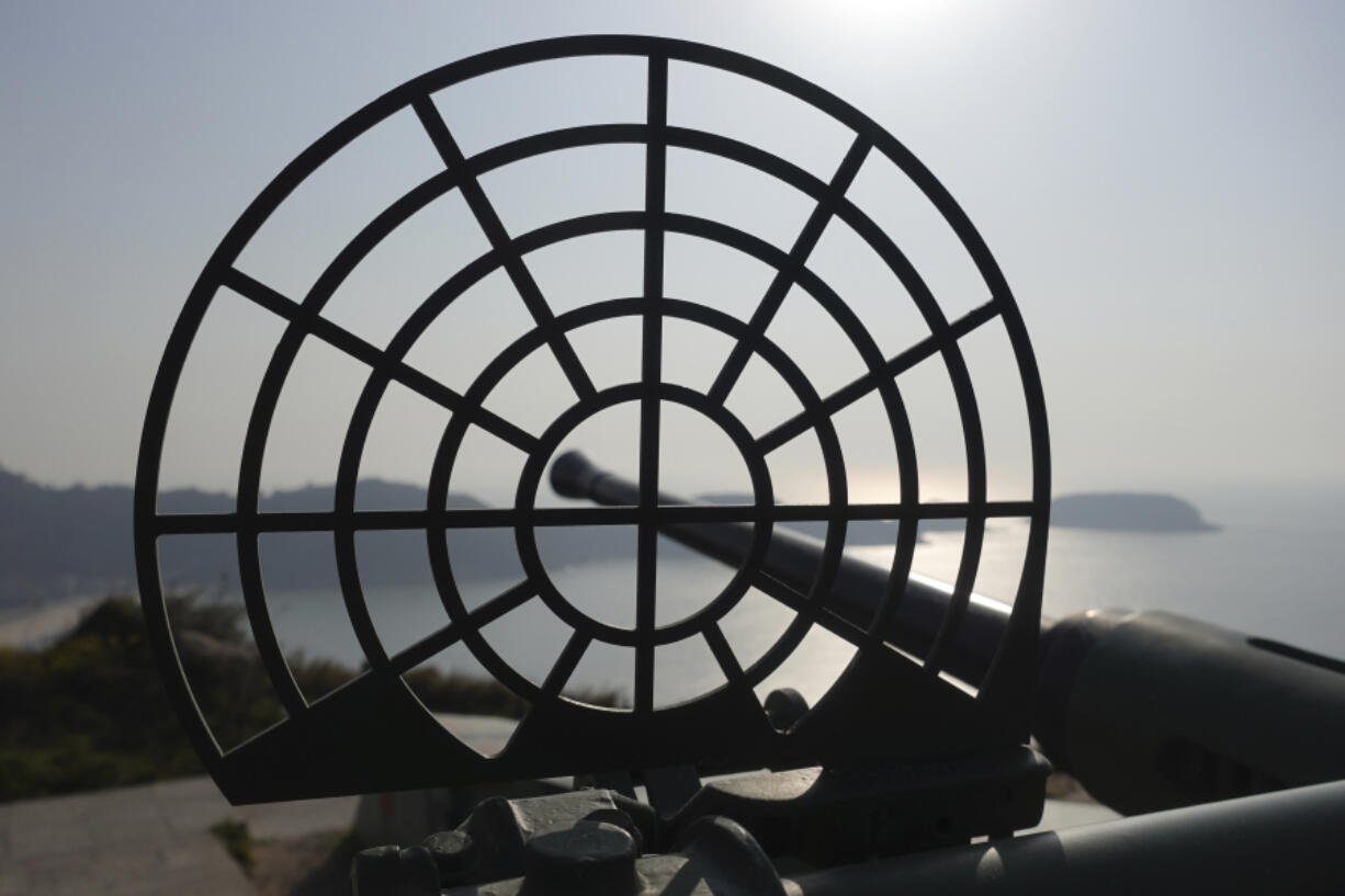 An antiquated 40mm anti-air gun points towards sea at the observation deck on Beigan, part of Matsu Islands, Taiwan on Sunday, March 5, 2023. Just 10km away from mainland China at its closest, Matsu became a fortress and frontline of defense for the Nationalists who had retreated to Taiwan in 1949 after losing to the Communist Party in a civil war.