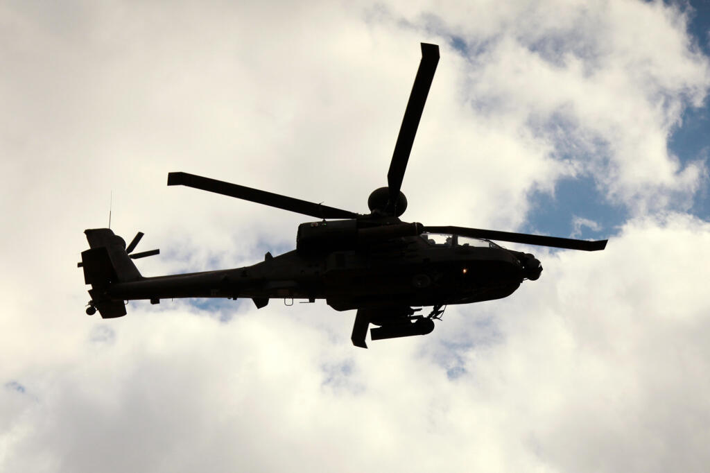 An AH-64 Apache helicopter. Two of the Army's helicopters from the 1st Attack Reconnaissance Battalion, 25th Aviation Regiment crashed during a training flight near Healy, Alaska.