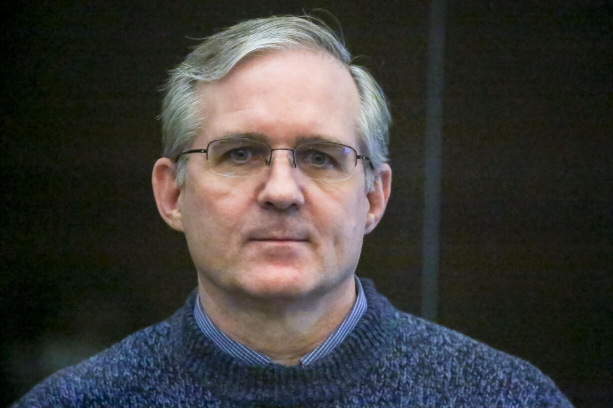 FILE - Paul Whelan, a former U.S. Marine who was arrested for alleged spying, listens to the verdict in a courtroom at the Moscow City Court in Moscow, Russia, June 15, 2020.  U.S. Secretary of State Antony Blinken said Wednesday he has "no doubt" that Russia has wrongfully detained an American reporter for The Wall Street Journal,  Evan Gershkovich, who was arrested last week on spying allegations.  Blinken's comments at NATO headquarters in Brussels urged his Russian counterpart, Sergey Lavrov, to immediately release Gershkovich as well as another imprisoned American, Paul Whelan, who had already been determined to have been wrongfully detained.