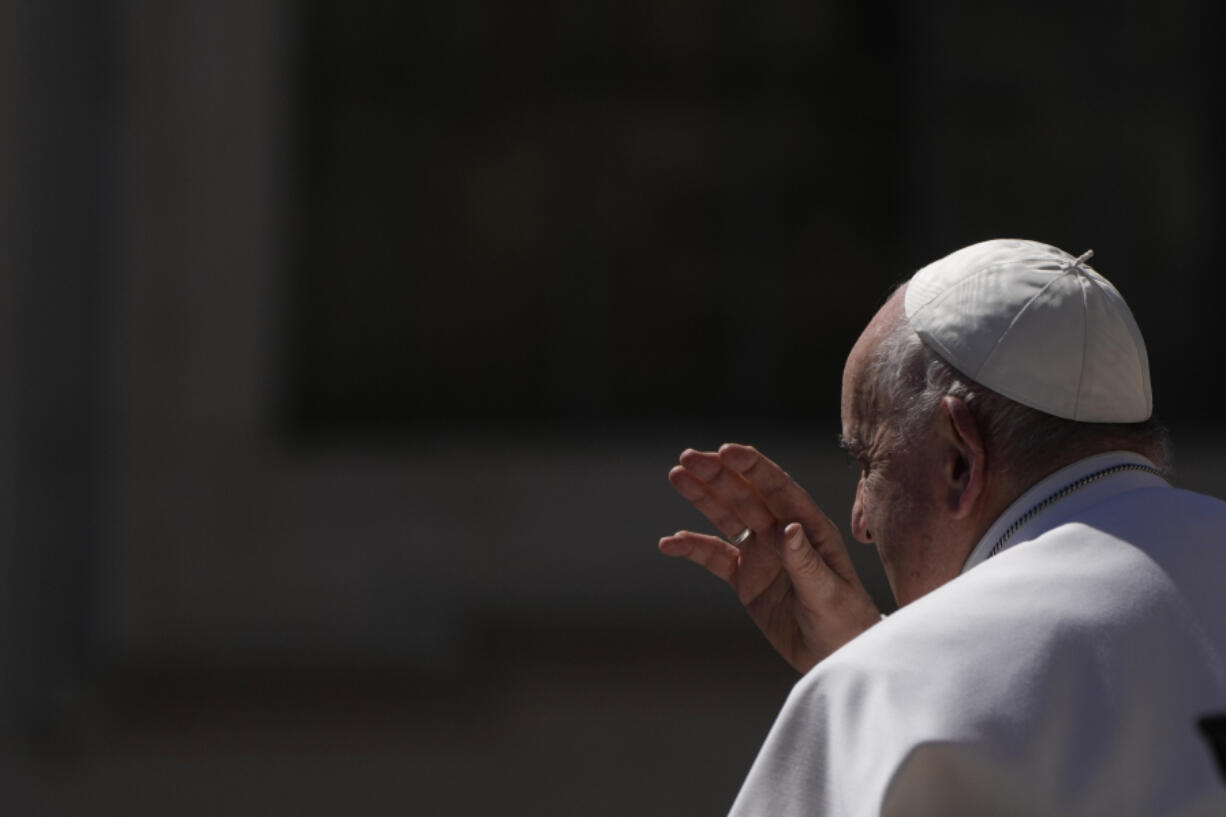 Pope Francis leaves at the end of his weekly general audience in St. Peter's Square, at the Vatican, Wednesday, April 26, 2023.