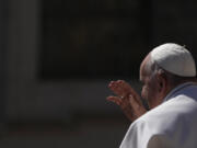 Pope Francis leaves at the end of his weekly general audience in St. Peter's Square, at the Vatican, Wednesday, April 26, 2023.