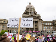 Demonstrators attend an abortion rights rally outside the Idaho State Capitol in Boise, Idaho, on May 14, 2022. (Sarah A.