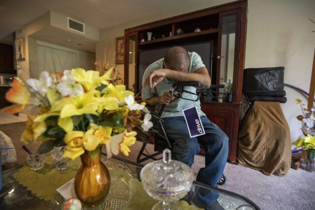 Roland Coleman, shown in his Arcadia living room, receives dialysis three times a week while he waits to hear whether he will be placed on the waiting list for a new kidney.