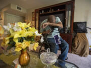 Roland Coleman, shown in his Arcadia living room, receives dialysis three times a week while he waits to hear whether he will be placed on the waiting list for a new kidney.