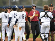 Prairie baseball players line up to greet Skyview players after a game on April 5 at Skyview High School.