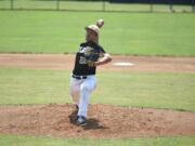 Hudson’s Bay starting pitcher Chanz Flores delivers a pitch in the first inning of a Class 2A first round state playoff game against White River on Saturday at W.F. West High School in Chehalis.